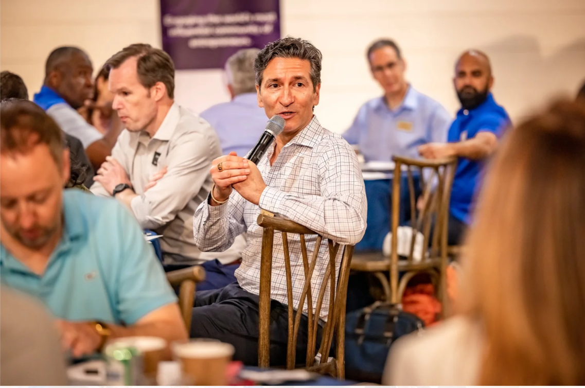 David Aferiat speaking at an EO event in 2023